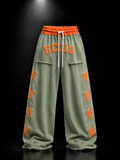 ECHOTICKS Orange Star Patch Wide-Leg Sweatpants | Streetwear